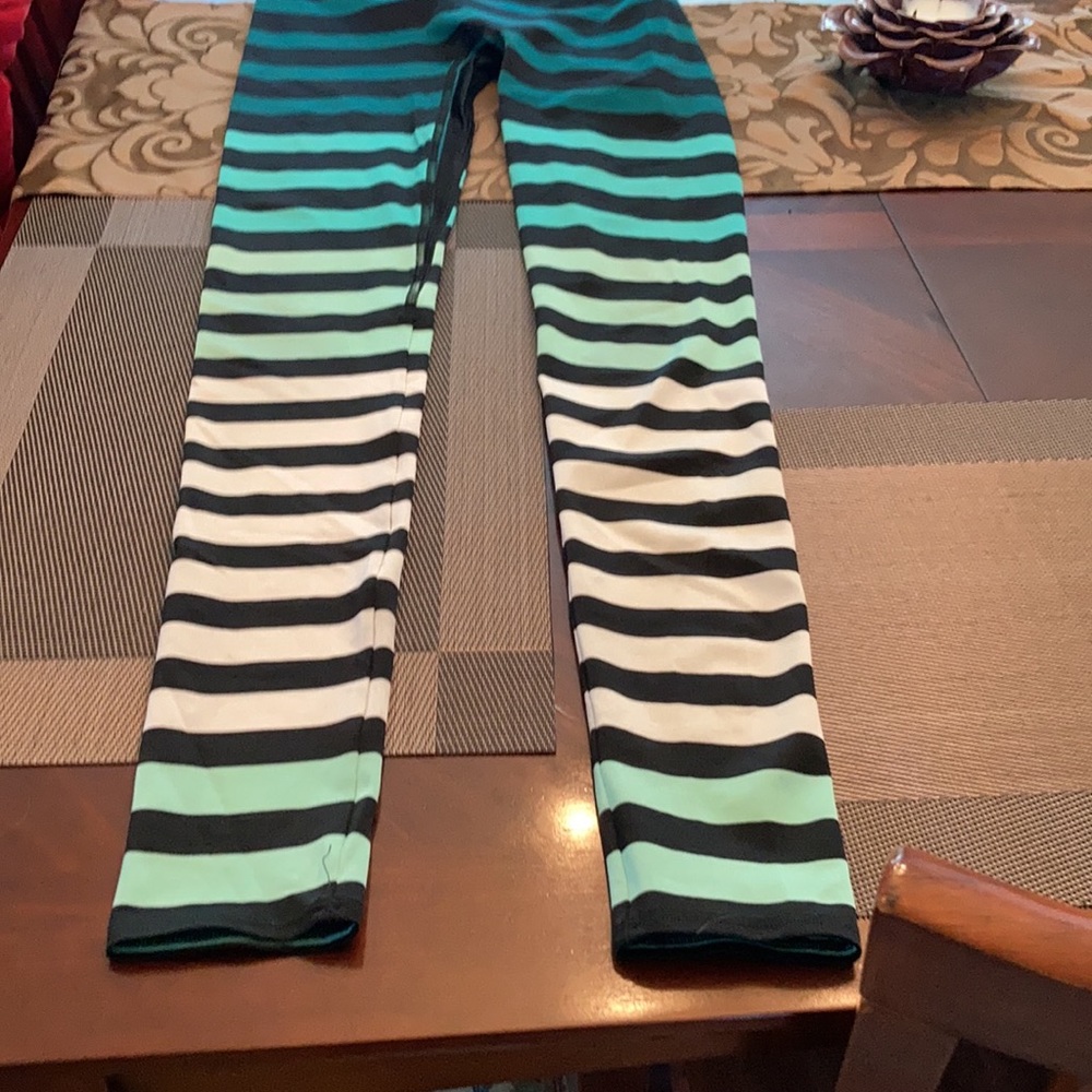 Hardly worn. Very flattering, no camel toe.